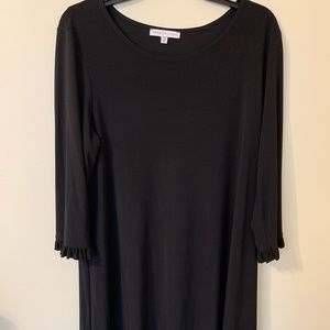 Ladies black dress with ruffle sleeve/hem.
